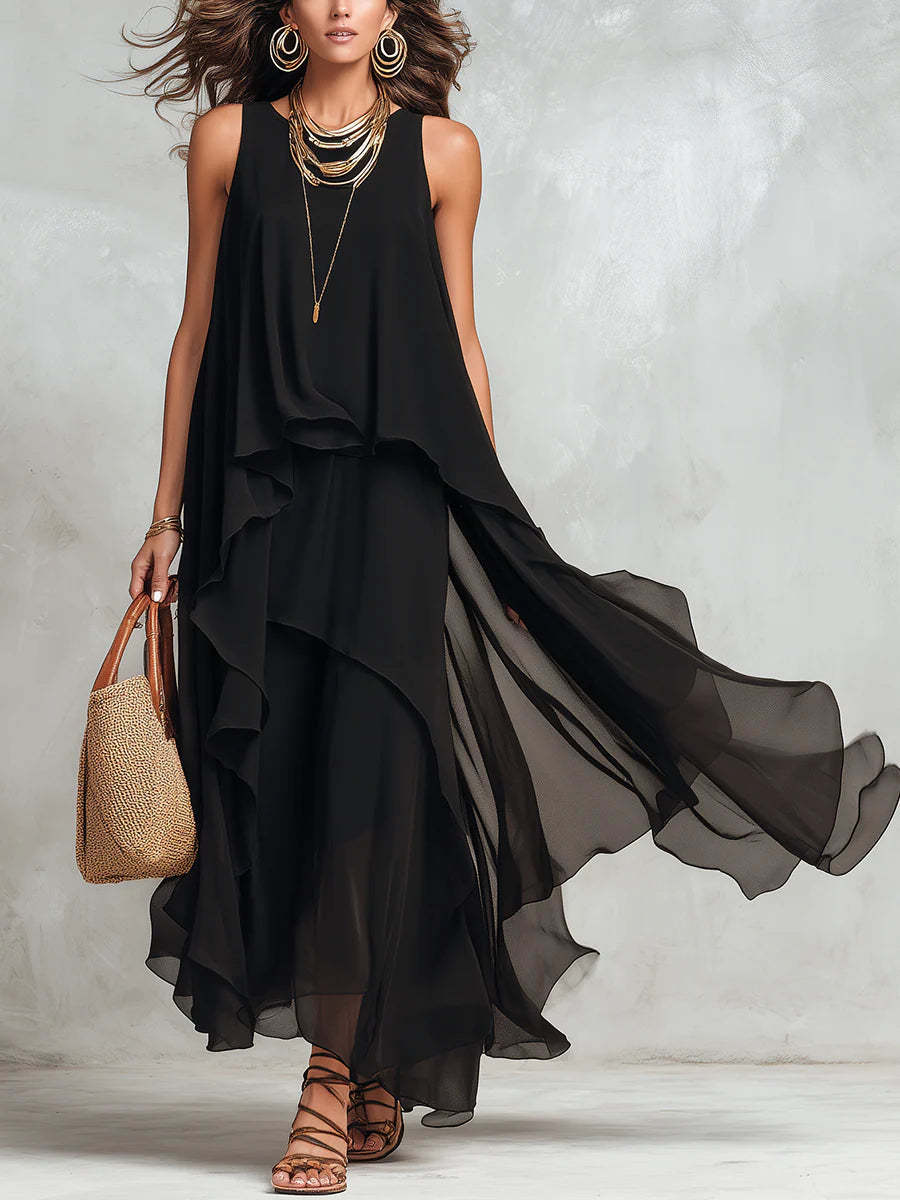 Schickes, fließendes, ärmelloses langes Chiffonkleid in Schwarz mit asymmetrischem Schnitt